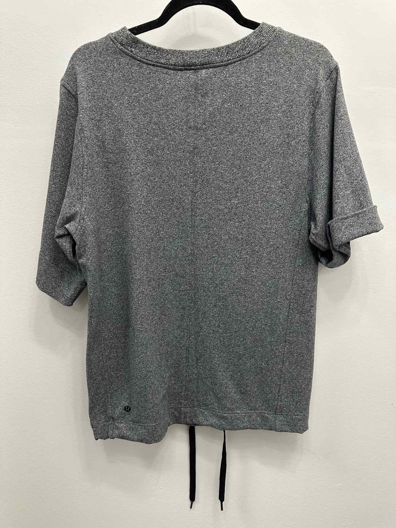 Lululemon Short Sleeve Heathered Drawstring Hem Size M/L Grey Sweater