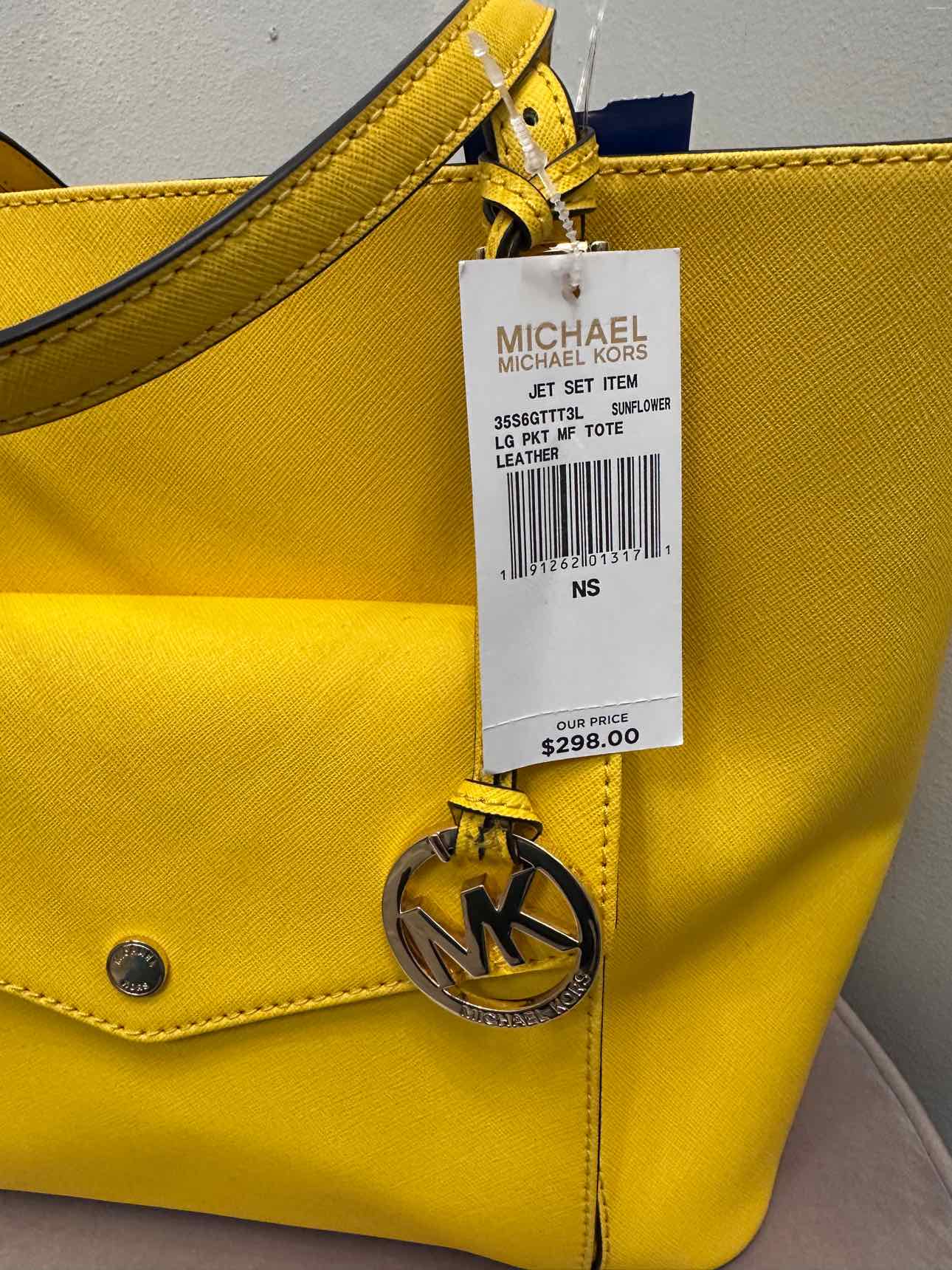 Michael Michael Kors Size M/L Yellow Handbags