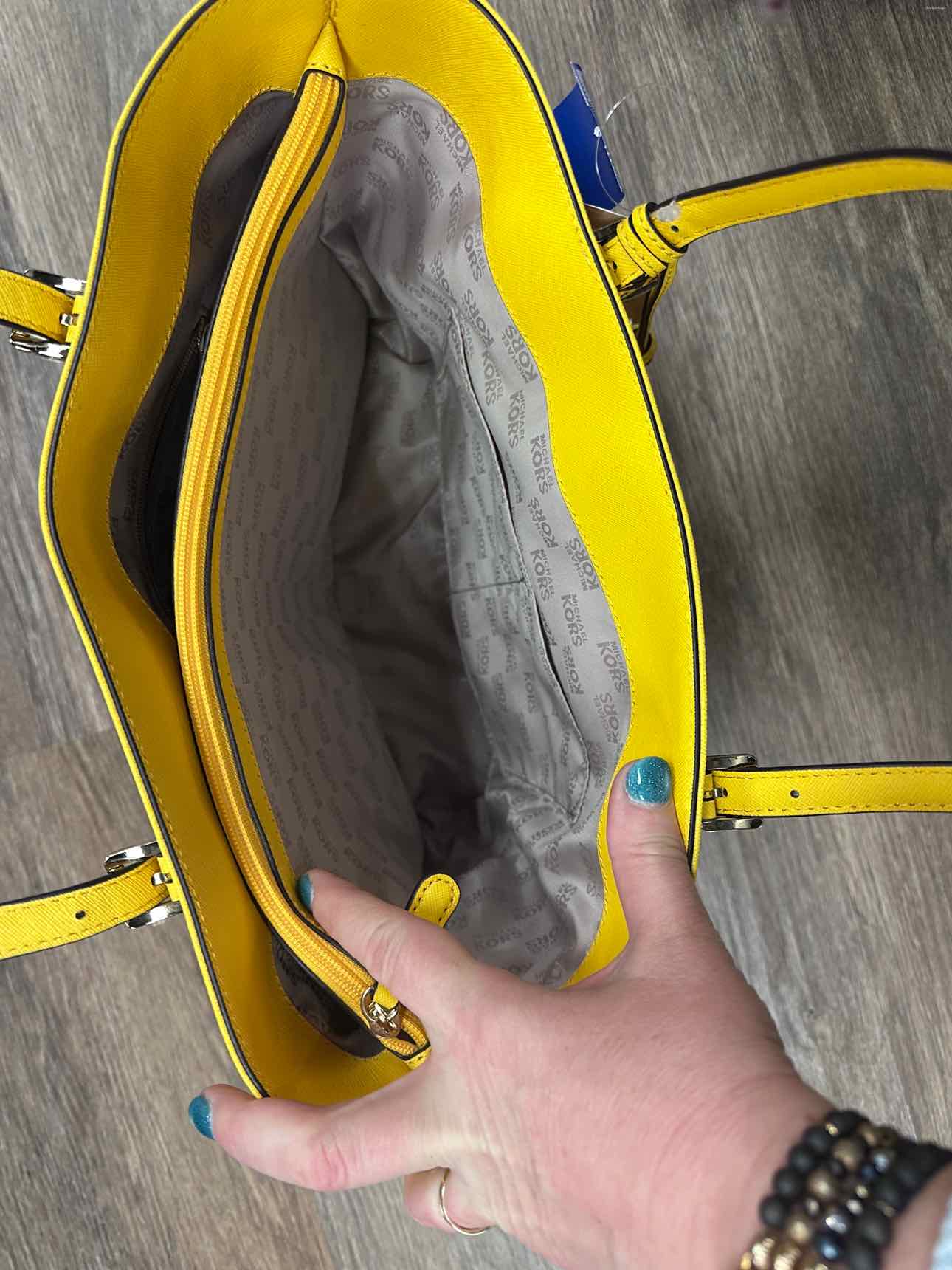 Michael Michael Kors Size M/L Yellow Handbags