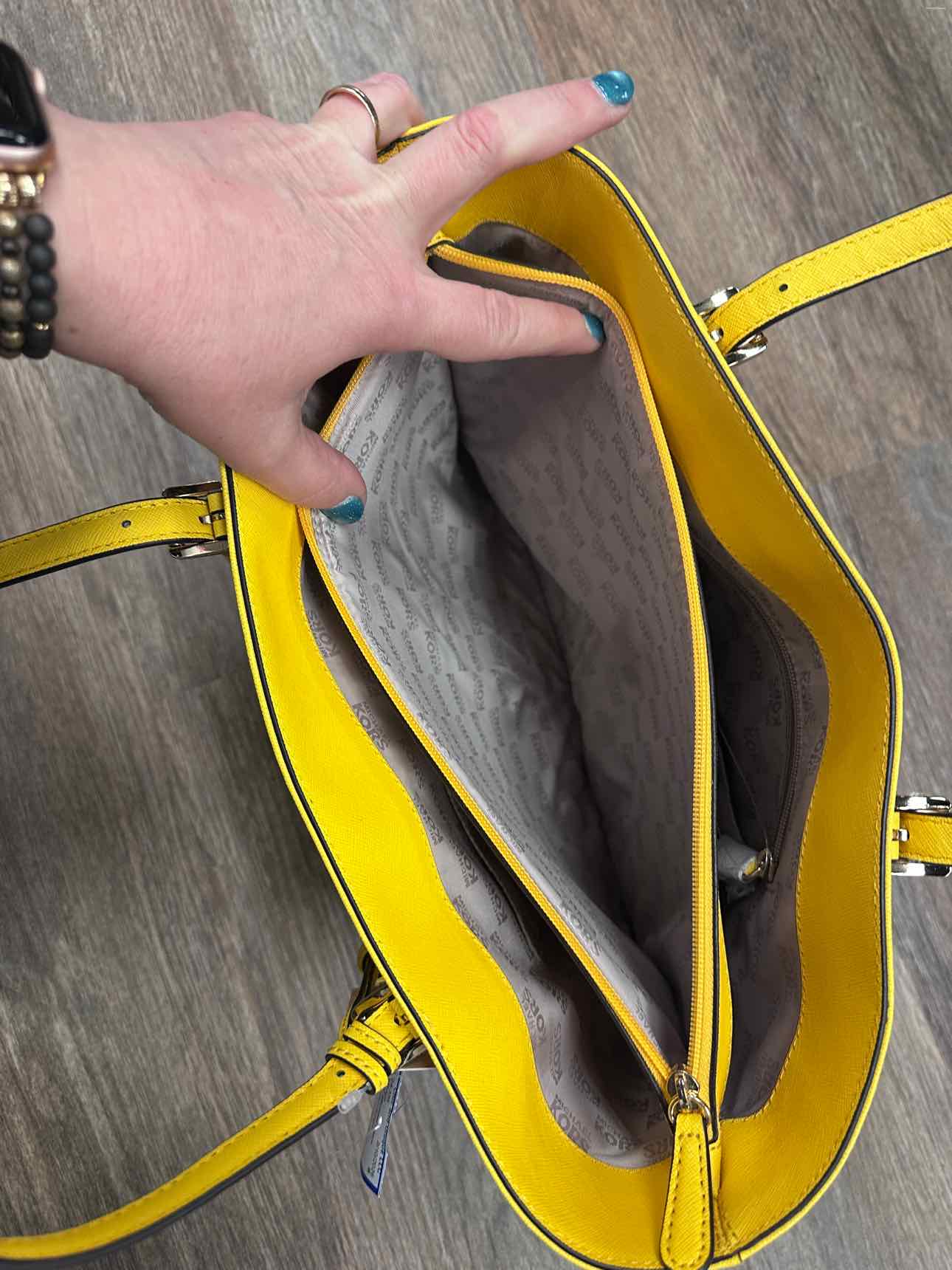 Michael Michael Kors Size M/L Yellow Handbags