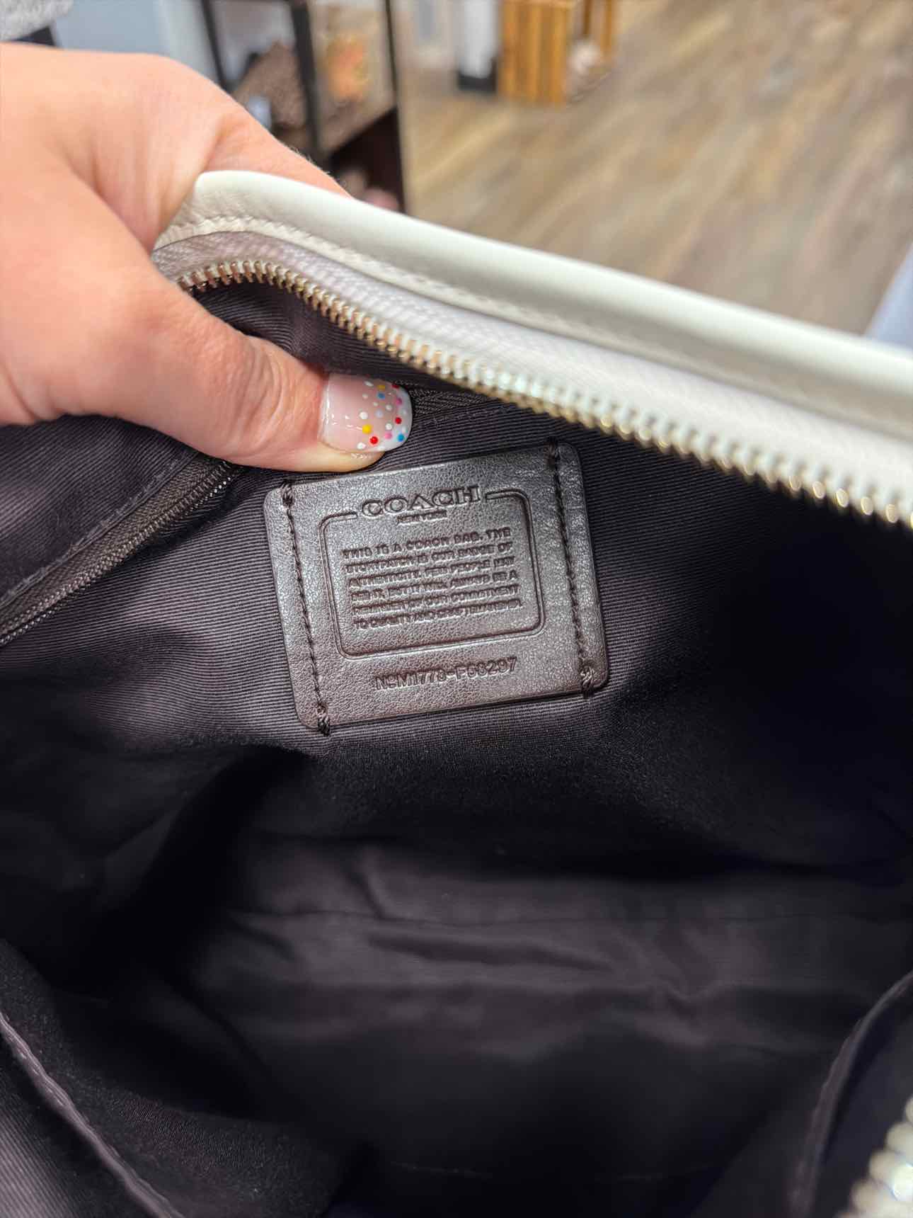 Coach Signature PVC Crossbody Tan Handbags